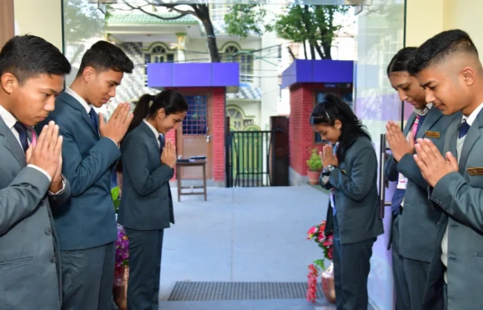 picture of students welcoming guests at college