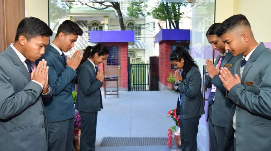 picture of students welcoming guests at college